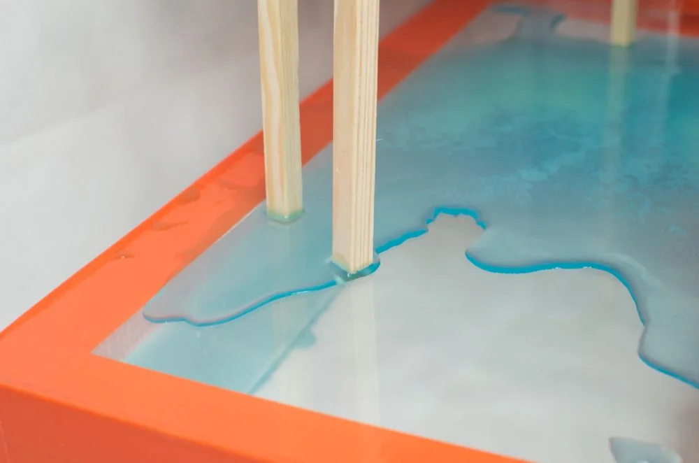 Epoxy floor coating with a decorative resin finish