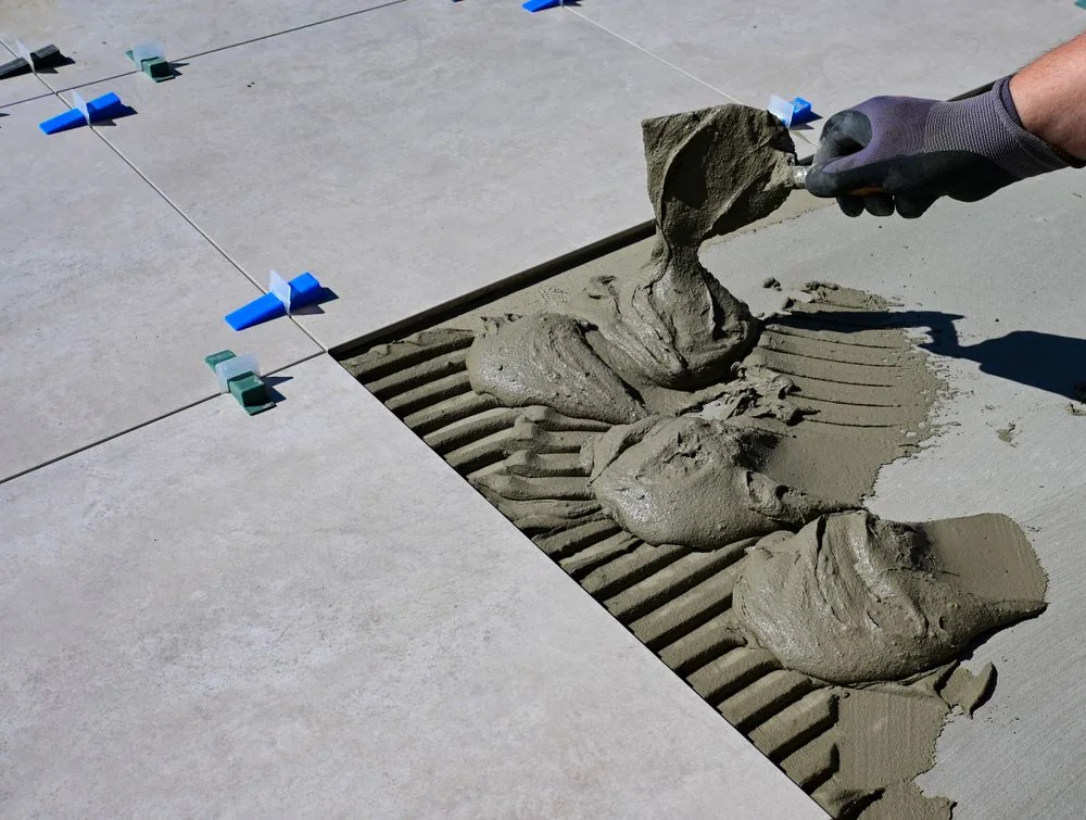 Tile flooring installation in progress