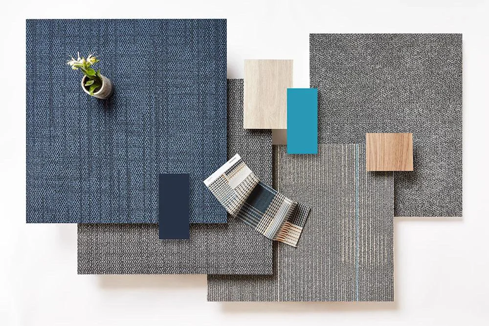 Commercial carpet tile samples in blue and gray