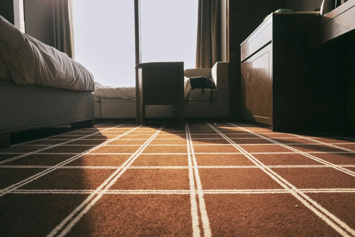 Patterned carpet in a residential bedroom